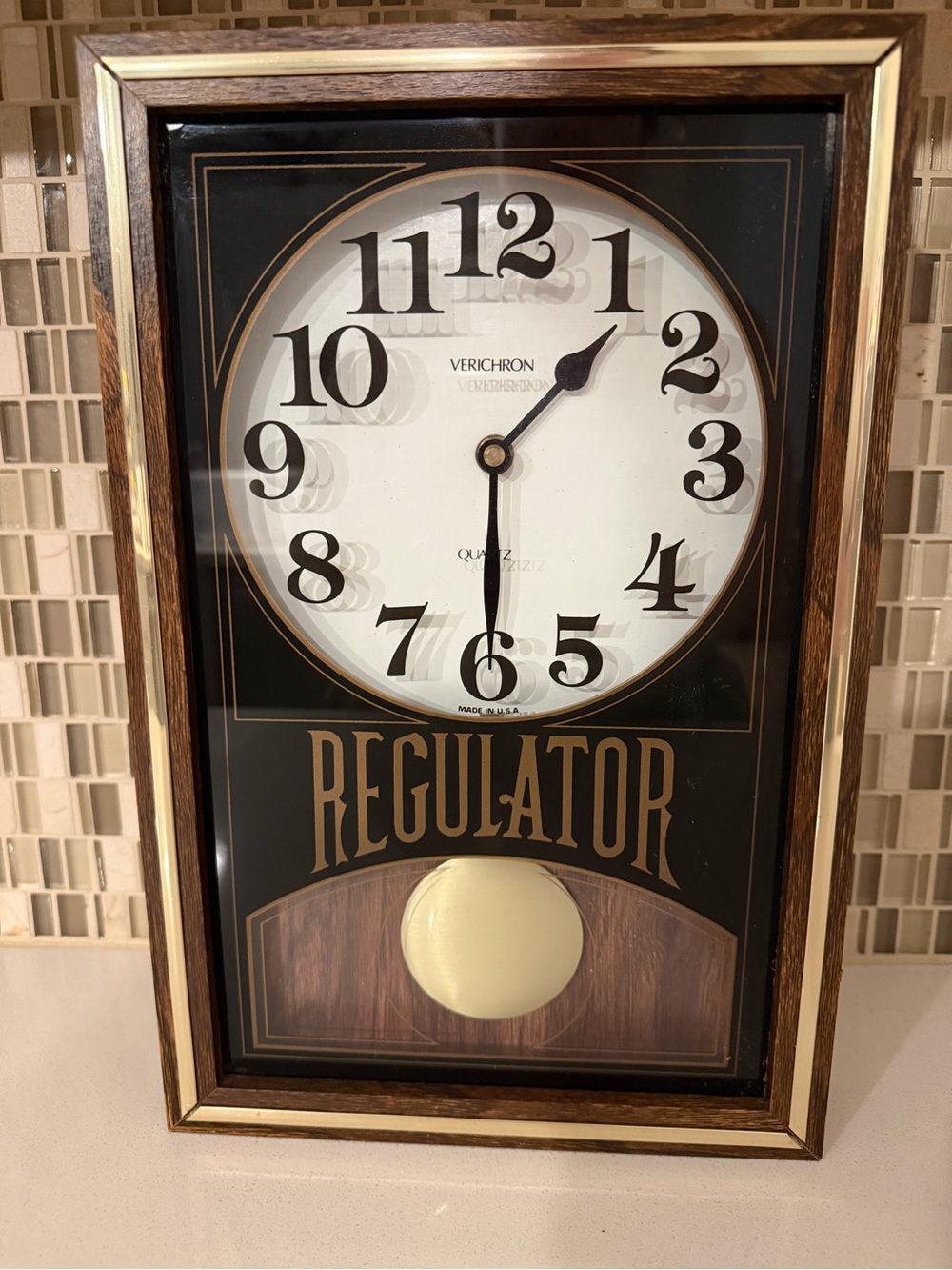 Brown and Black Regulator Wall Clock